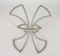 Mesa de centro redonda de metal y vidrio