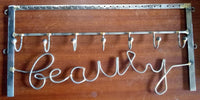 Beauty wall decor with hanger